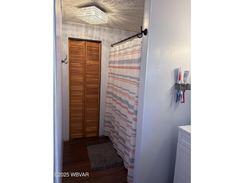 Three bedroom home in Jersey Shore is move in ready. Attic has a - photo 12