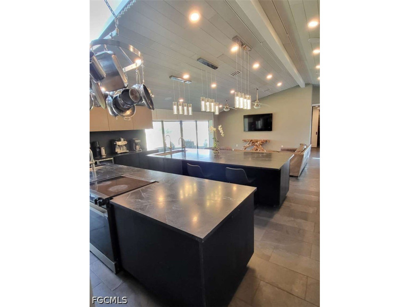 Experience refined Naples living in this beautifully updated - photo 3