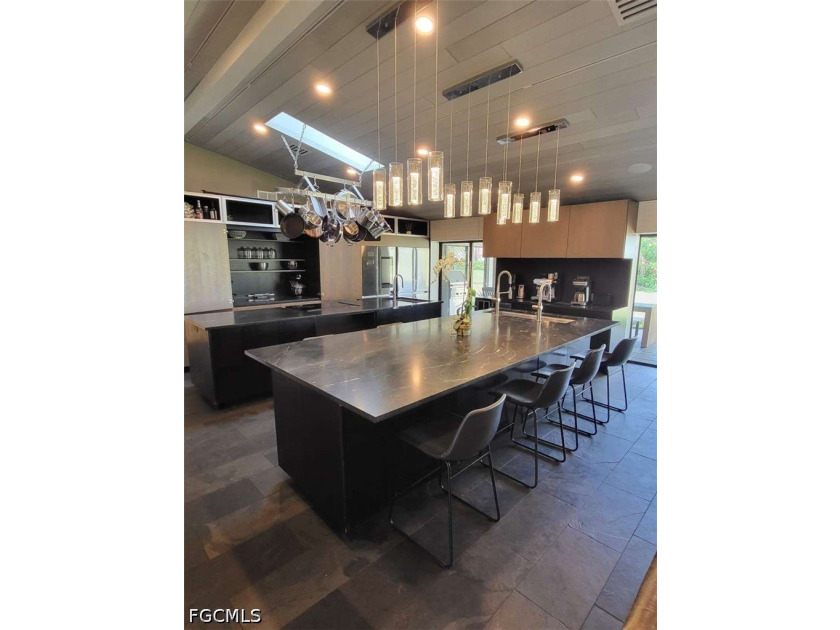 Experience refined Naples living in this beautifully updated - photo 5