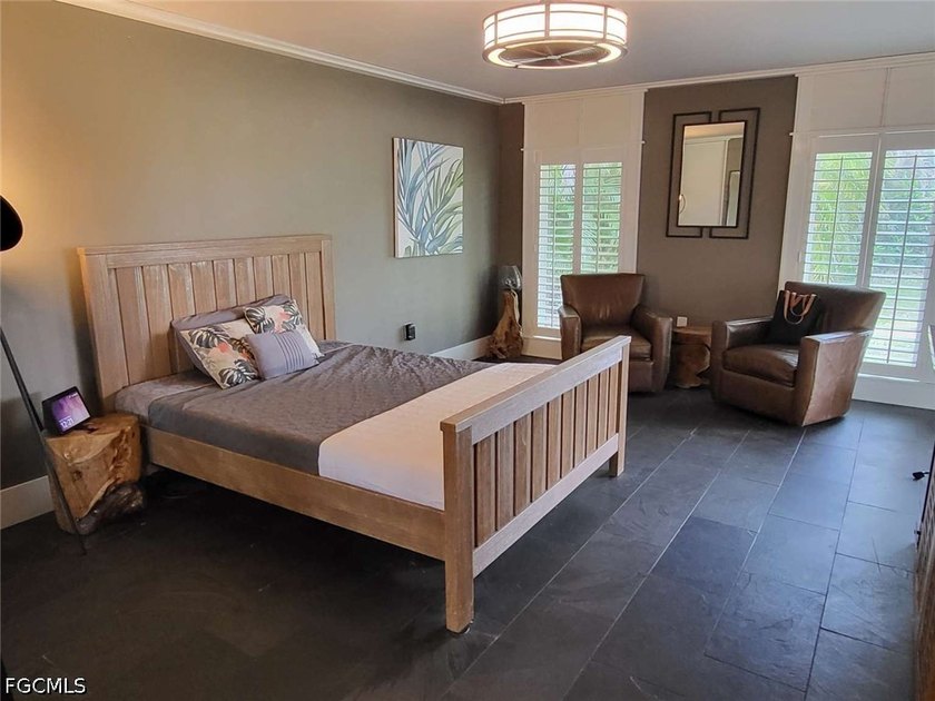 Experience refined Naples living in this beautifully updated - photo 6