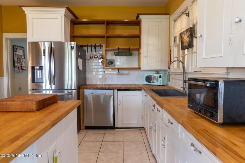 This home offers the best of both worlds, historic character - photo 36