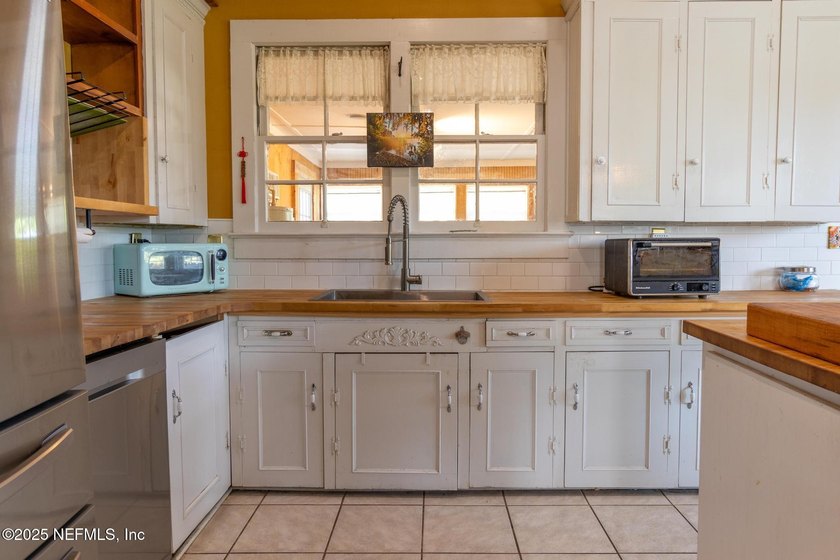 This home offers the best of both worlds, historic character - photo 38