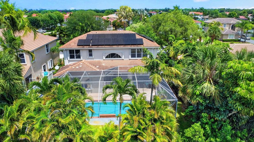 Set within the highly sought-after gated golf community of - photo 2