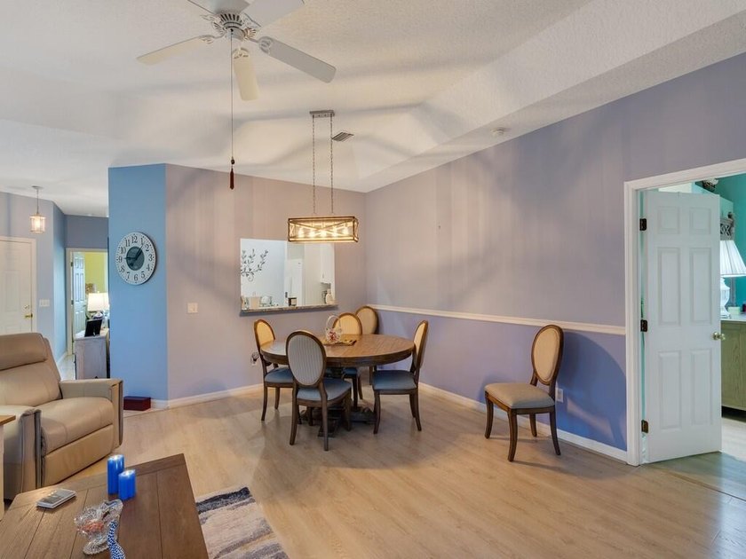 Located on the 5th tee at Gator Trace CC, this beautiful villa - photo 11