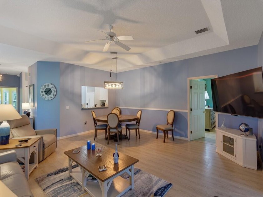 Located on the 5th tee at Gator Trace CC, this beautiful villa - photo 12