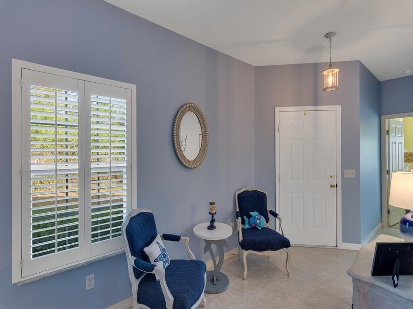 Located on the 5th tee at Gator Trace CC, this beautiful villa - photo 13