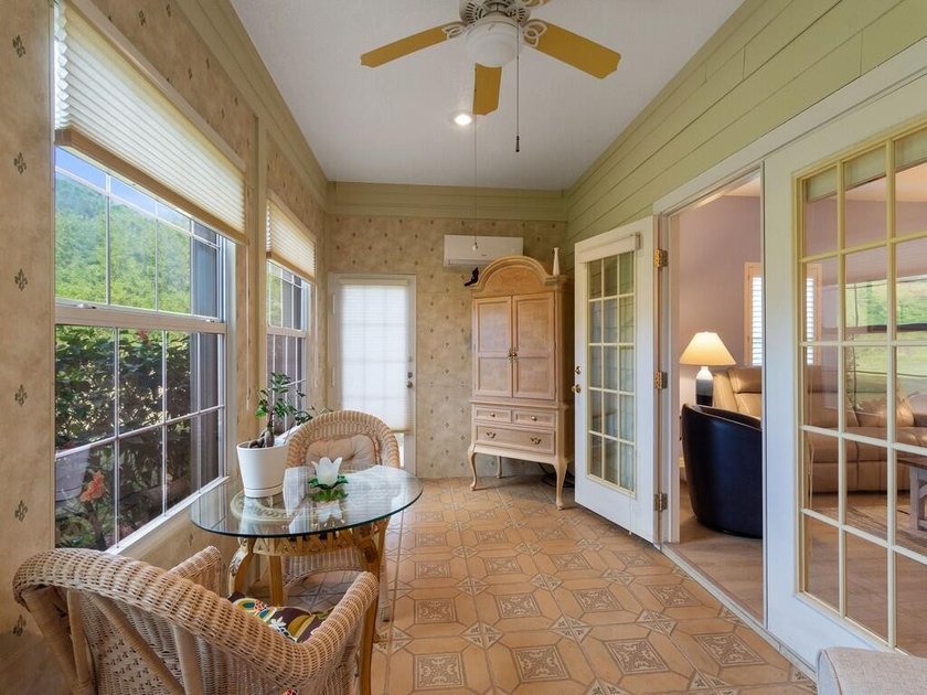 Located on the 5th tee at Gator Trace CC, this beautiful villa - photo 20