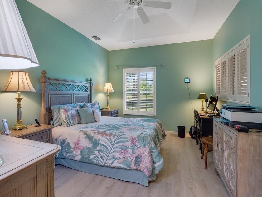 Located on the 5th tee at Gator Trace CC, this beautiful villa - photo 22