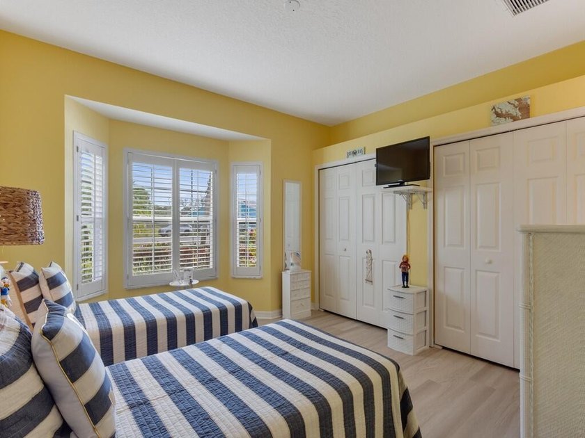 Located on the 5th tee at Gator Trace CC, this beautiful villa - photo 26