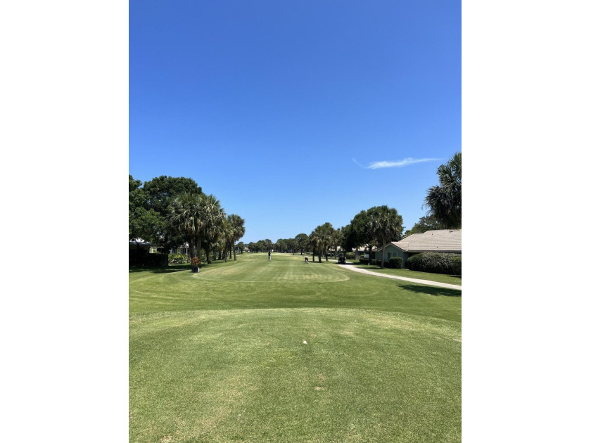 Located on the 5th tee at Gator Trace CC, this beautiful villa - photo 29