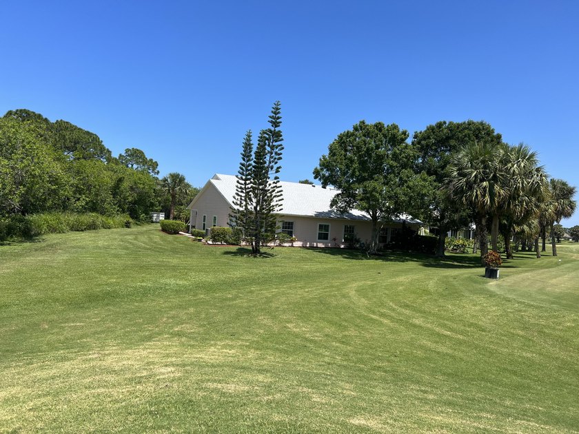 Located on the 5th tee at Gator Trace CC, this beautiful villa - photo 30