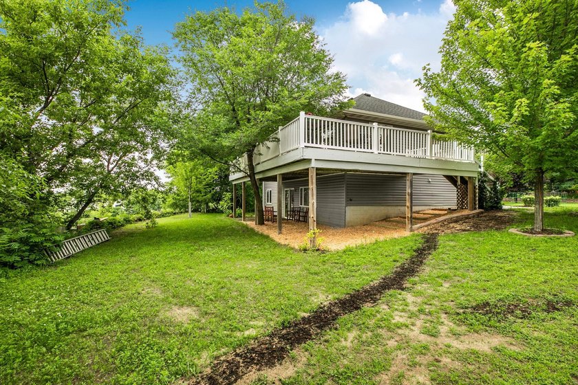 Welcome home to this beautiful 4-bedroom, 3-bathroom residence - photo 30