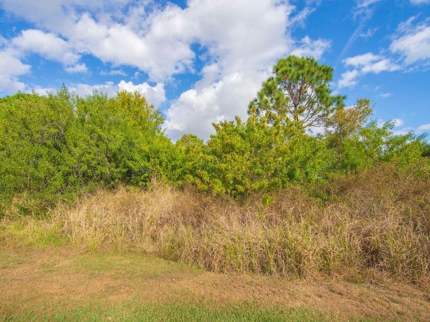 Located on the 5th tee at Gator Trace CC, this beautiful villa - photo 37
