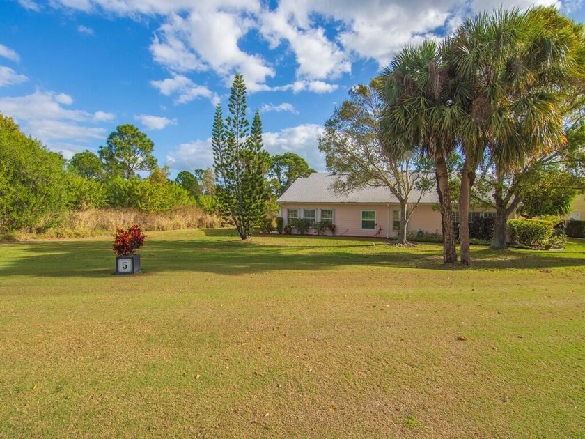Located on the 5th tee at Gator Trace CC, this beautiful villa - photo 38
