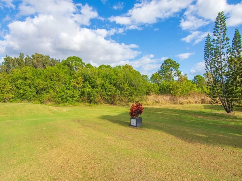 Located on the 5th tee at Gator Trace CC, this beautiful villa - photo 39