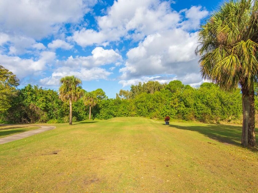 Located on the 5th tee at Gator Trace CC, this beautiful villa - photo 40