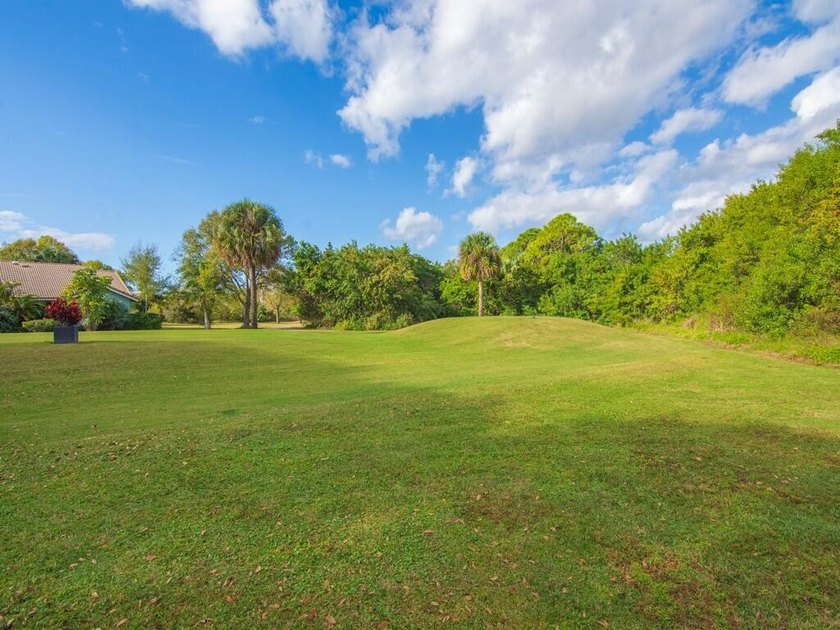 Located on the 5th tee at Gator Trace CC, this beautiful villa - photo 41