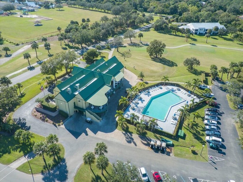 Located on the 5th tee at Gator Trace CC, this beautiful villa - photo 45