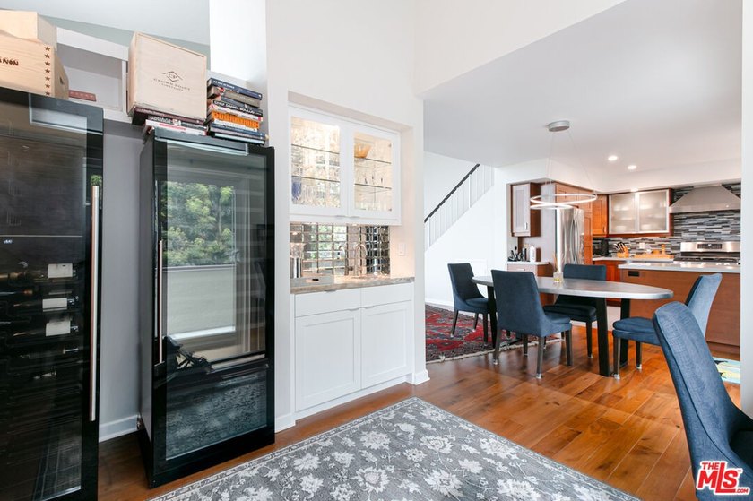 $50,000 Price Adjustment. Stunning light-filled, renovated end - photo 10