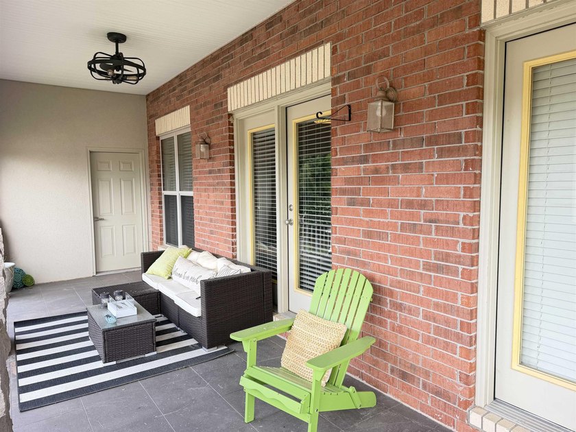 Enjoy easy, ground-level living in this beautifully maintained - photo 7
