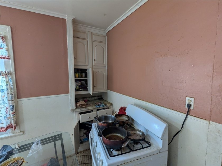 Great value-add DUPLEX opportunity! Property sustained a house - photo 15