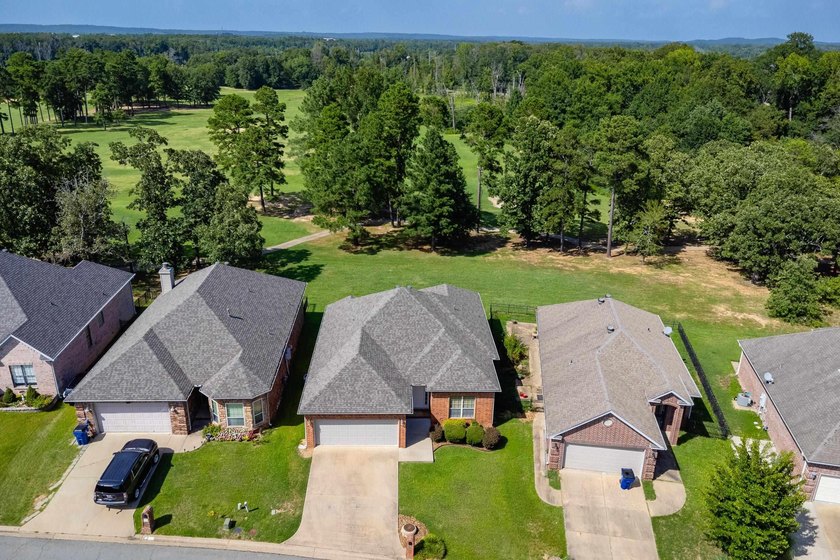 Welcome golfers! Pretty home with a great floorplan backing up - photo 3