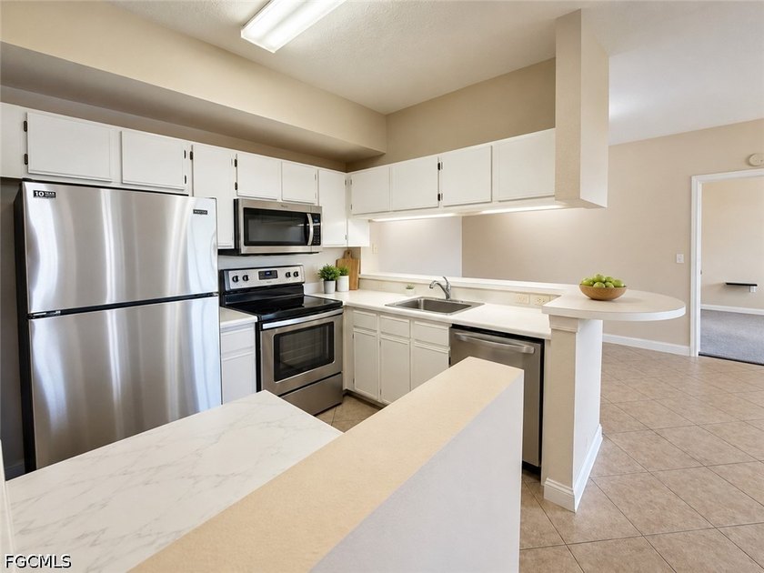 Rarely available lakefront condo in the gated community of - photo 8