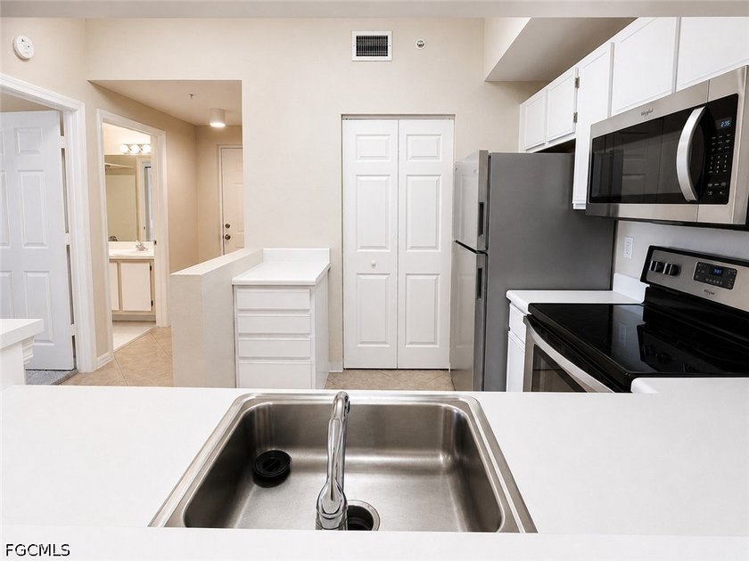Rarely available lakefront condo in the gated community of - photo 10