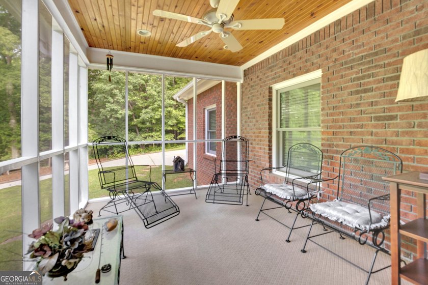 This custom-built full-time lake residence on Jackson Lake is an - photo 38