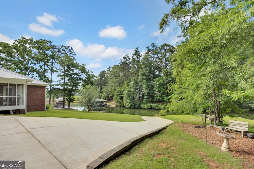 This custom-built full-time lake residence on Jackson Lake is an - photo 55