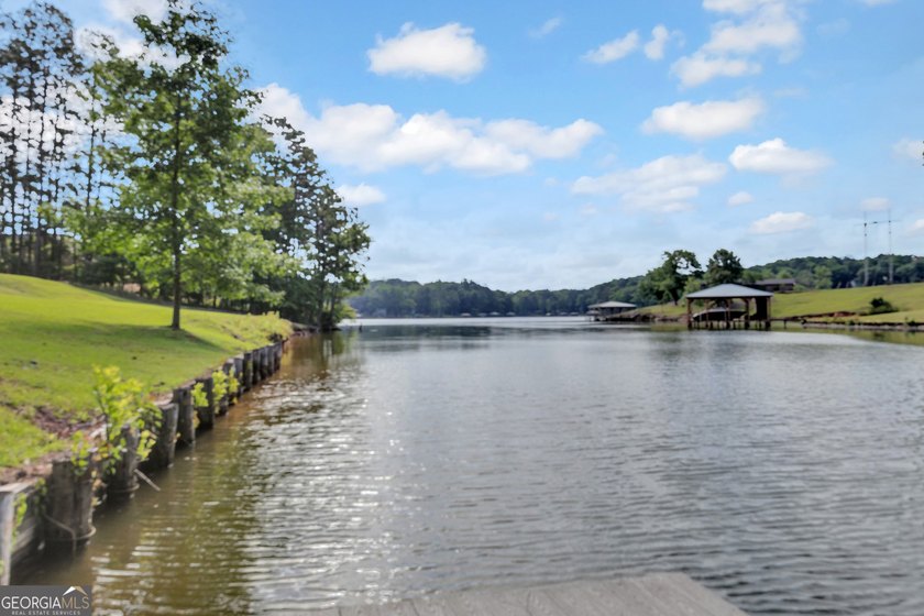 This custom-built full-time lake residence on Jackson Lake is an - photo 60
