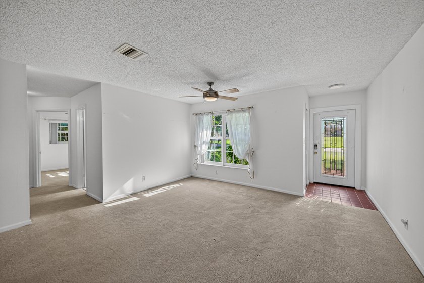 A fantastic location in a well-manicured community. This large 2 - photo 14