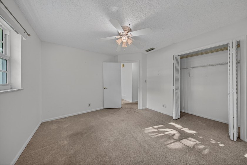 A fantastic location in a well-manicured community. This large 2 - photo 36