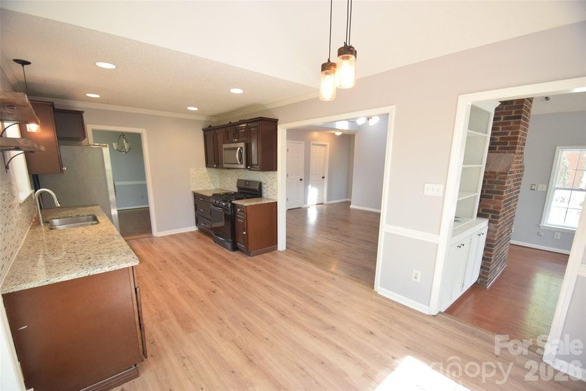 Improved pricing! Welcome to this 1.5-story home offering both - photo 13