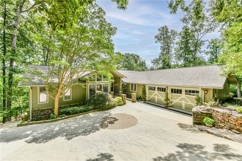 SPECTACULAR YEAR-ROUND WATER VIEWS of Lake Keowee from all of - photo 50