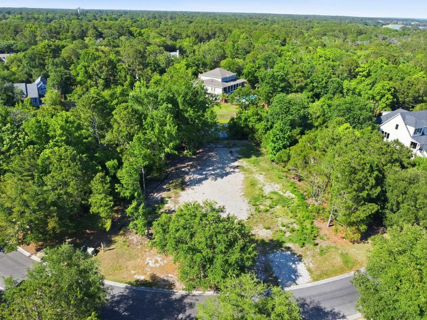 Buildable 0.51-acre pond-view homesite on Colony Club Drive in - photo 14