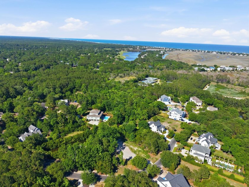 Buildable 0.51-acre pond-view homesite on Colony Club Drive in - photo 23