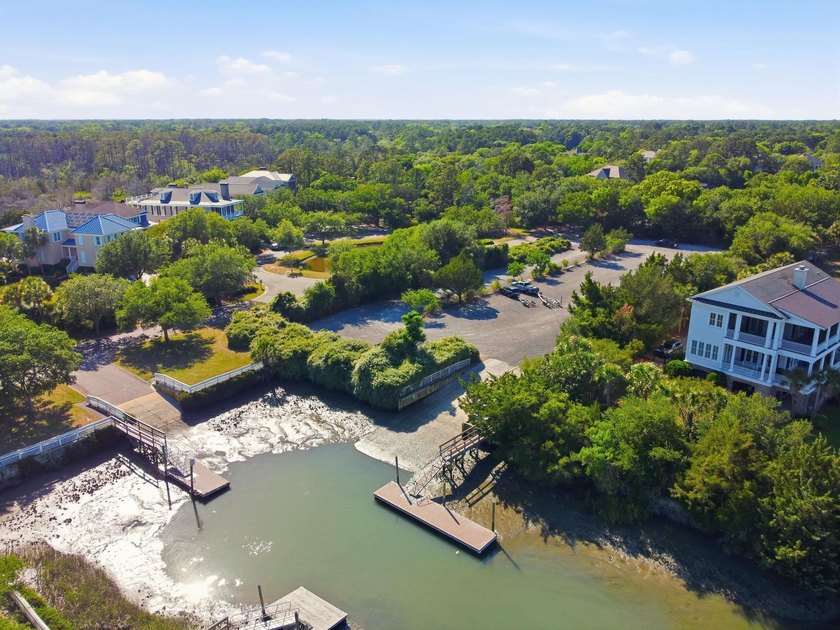 Buildable 0.51-acre pond-view homesite on Colony Club Drive in - photo 25
