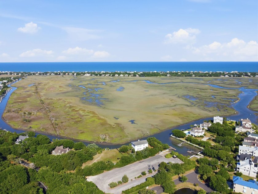 Buildable 0.51-acre pond-view homesite on Colony Club Drive in - photo 26