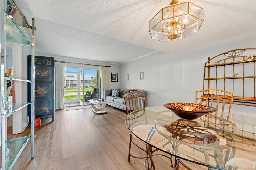BEAUTIFUL LAKE VIEWS | 1st FLOOR UNIT | 2-bedrooms/1.5-baths - photo 7