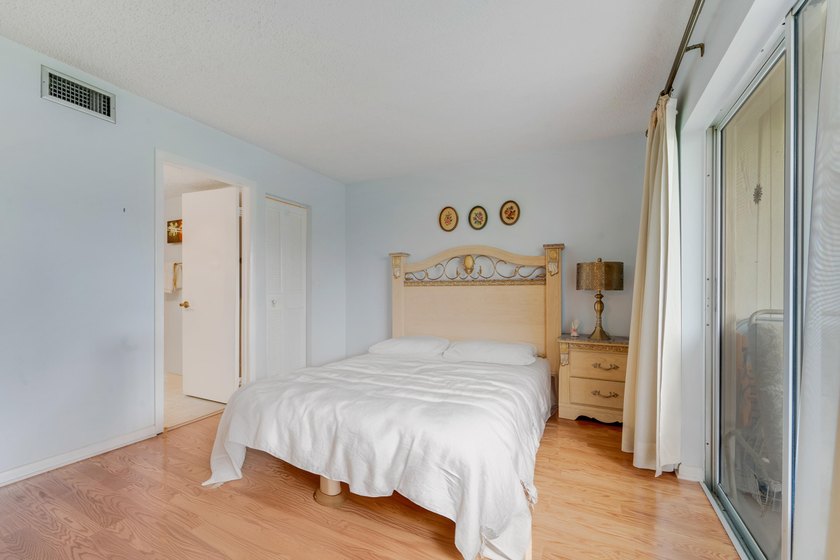 BEAUTIFUL LAKE VIEWS | 1st FLOOR UNIT | 2-bedrooms/1.5-baths - photo 9