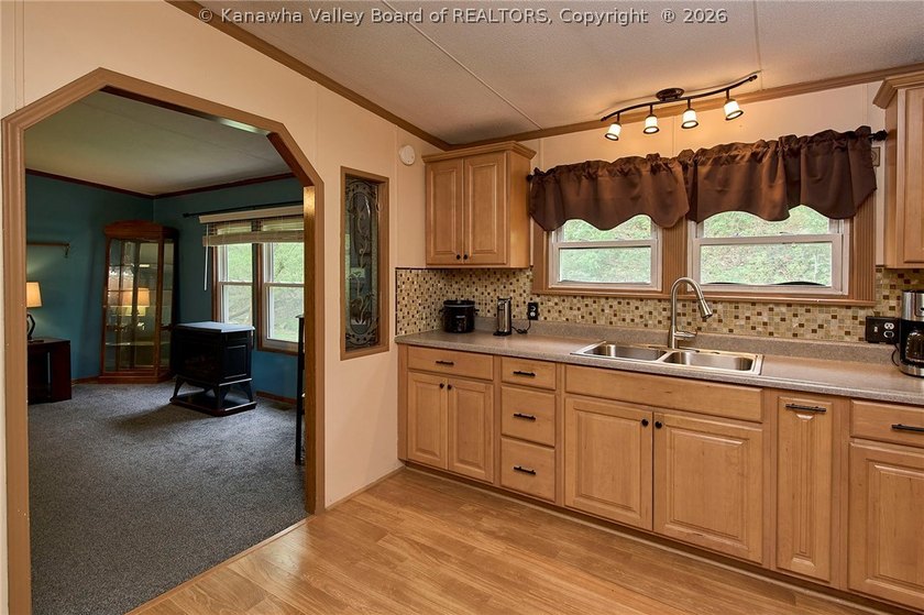 Situated on two acres in rural Milton, this 1996 double-wide - photo 14