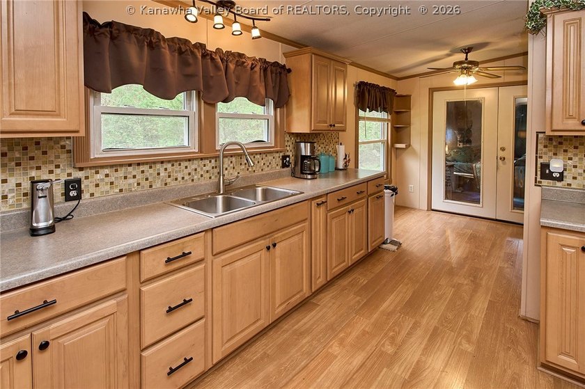 Situated on two acres in rural Milton, this 1996 double-wide - photo 15