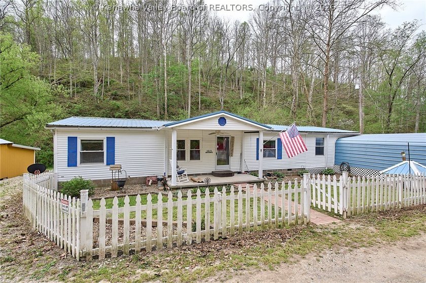 Situated on two acres in rural Milton, this 1996 double-wide - photo 23