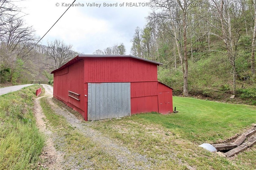 Situated on two acres in rural Milton, this 1996 double-wide - photo 24