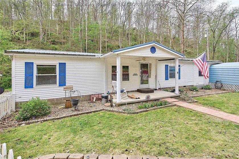 Situated on two acres in rural Milton, this 1996 double-wide - photo 32