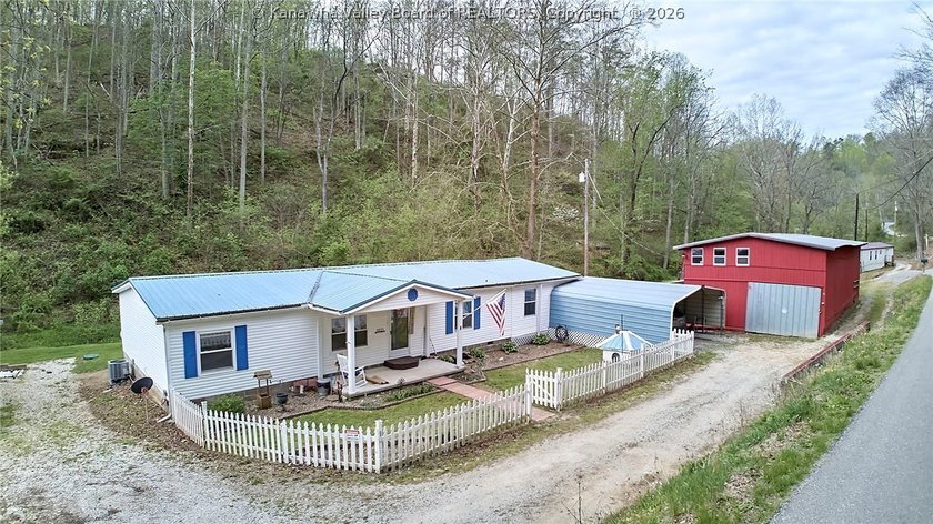 Situated on two acres in rural Milton, this 1996 double-wide - photo 33