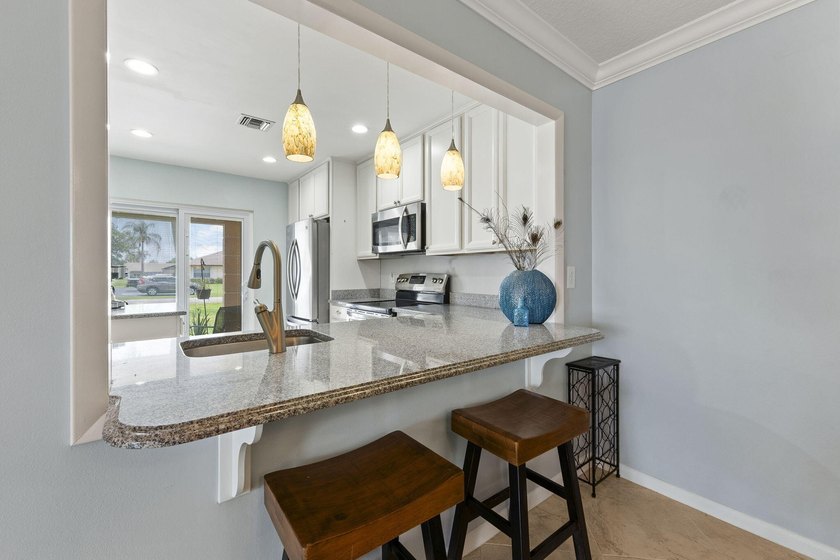 End-unit condo in 55+ community offering added privacy, abundant - photo 6