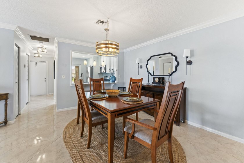 End-unit condo in 55+ community offering added privacy, abundant - photo 7