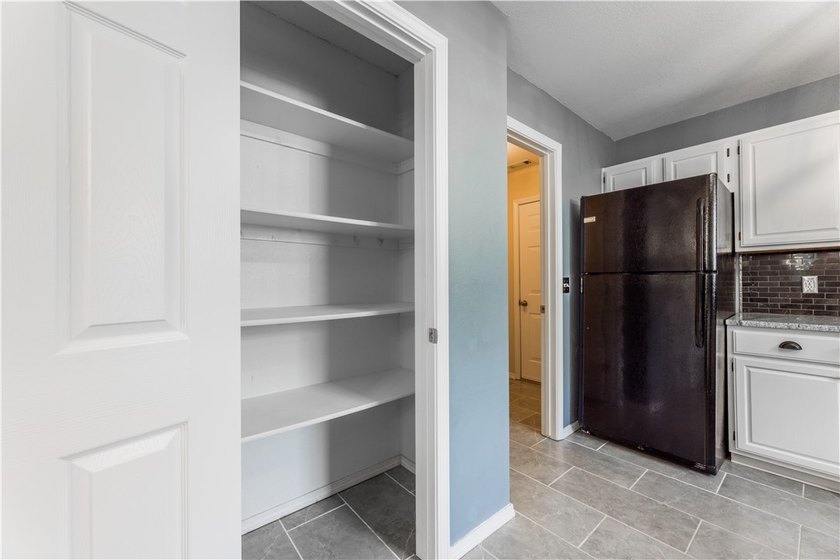 Tucked beneath a mature hardwood canopy in an established - photo 14